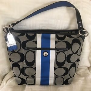 Authentic Coach pocketbook.